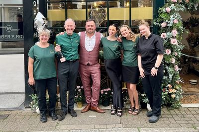 Image of Mark, Olly and the team of florists at the shop opening.