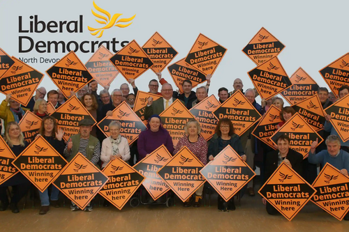 North Devon Lib Dems supporters with Parliamentary Candidate Ian Roome holding up Lib Dem posters
